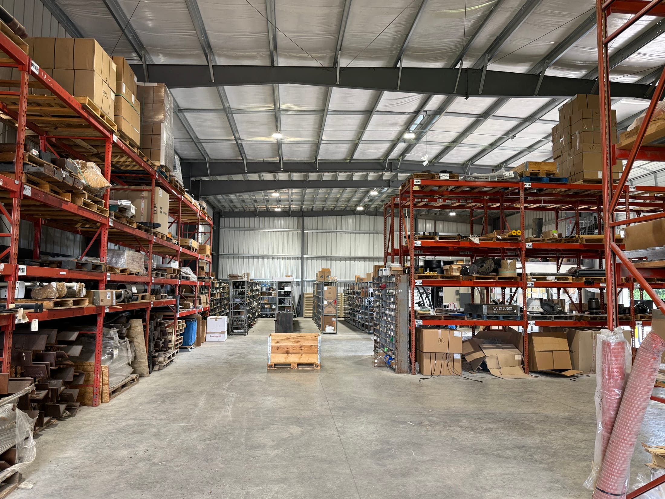 Closner parts warehouse bins and stocked shelving in Schertz Texas