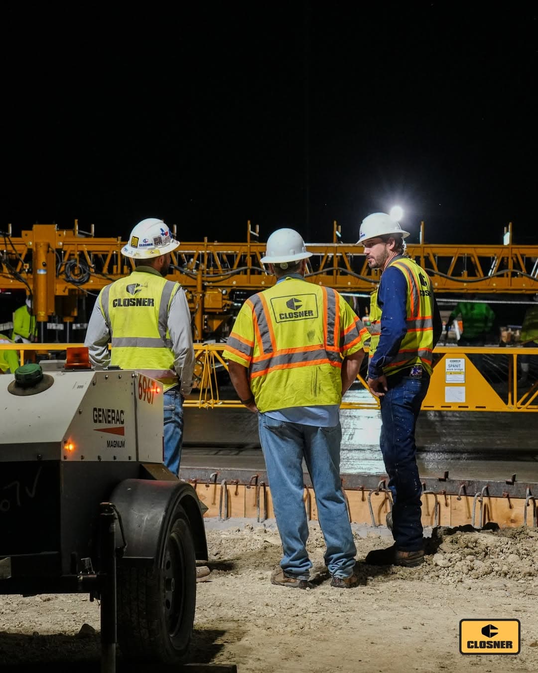Closner team members standing with equipment at the Elgin branch