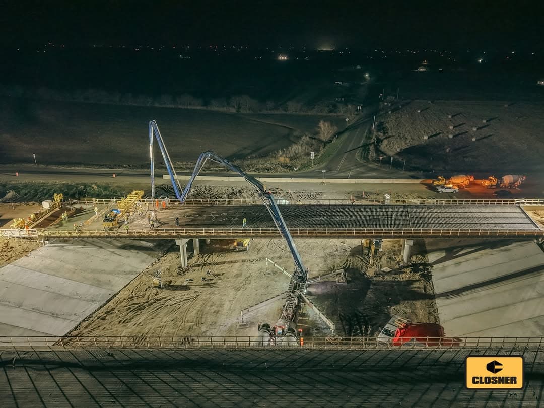 Road crew working with Closner-supported construction equipment