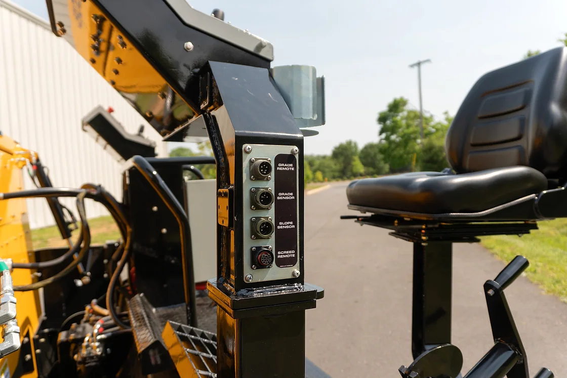Mauldin 1860C Commercial Asphalt Paver feed and hopper area OEM photo