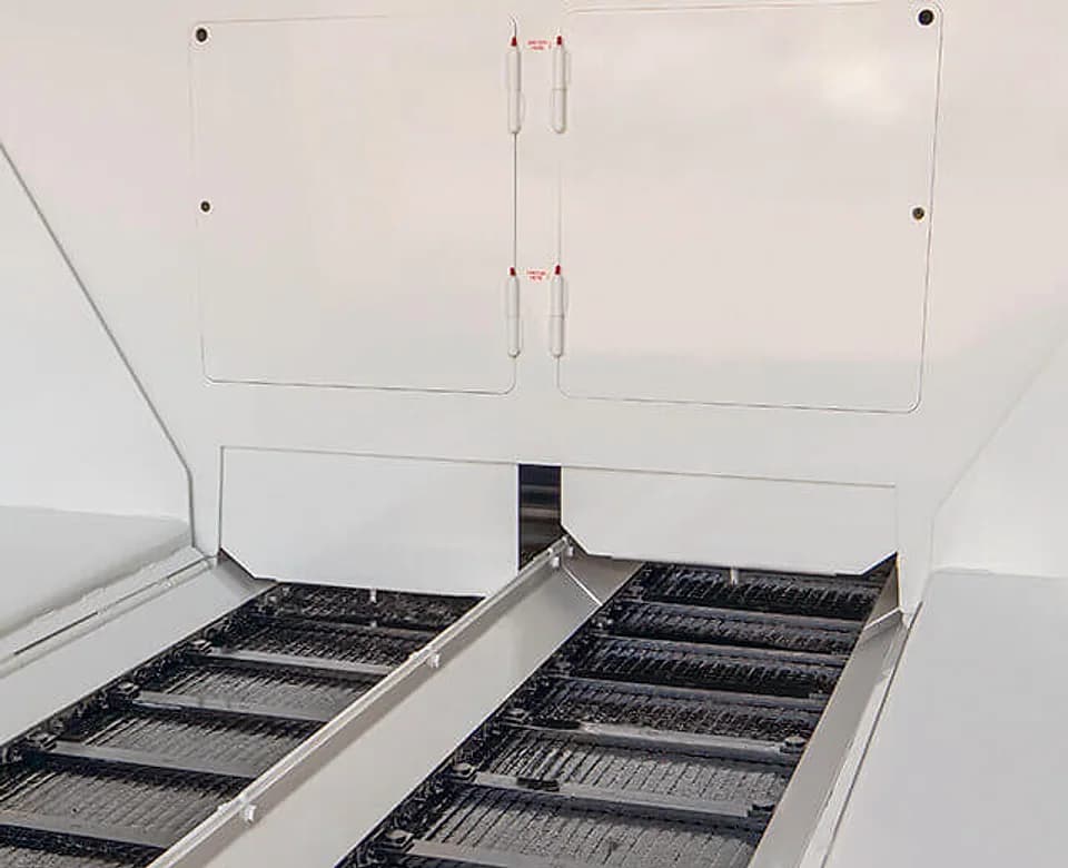 Roadtec highway paver flow gate and material feed opening