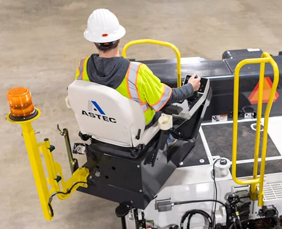 Roadtec highway paver operator station view showing clear sight lines