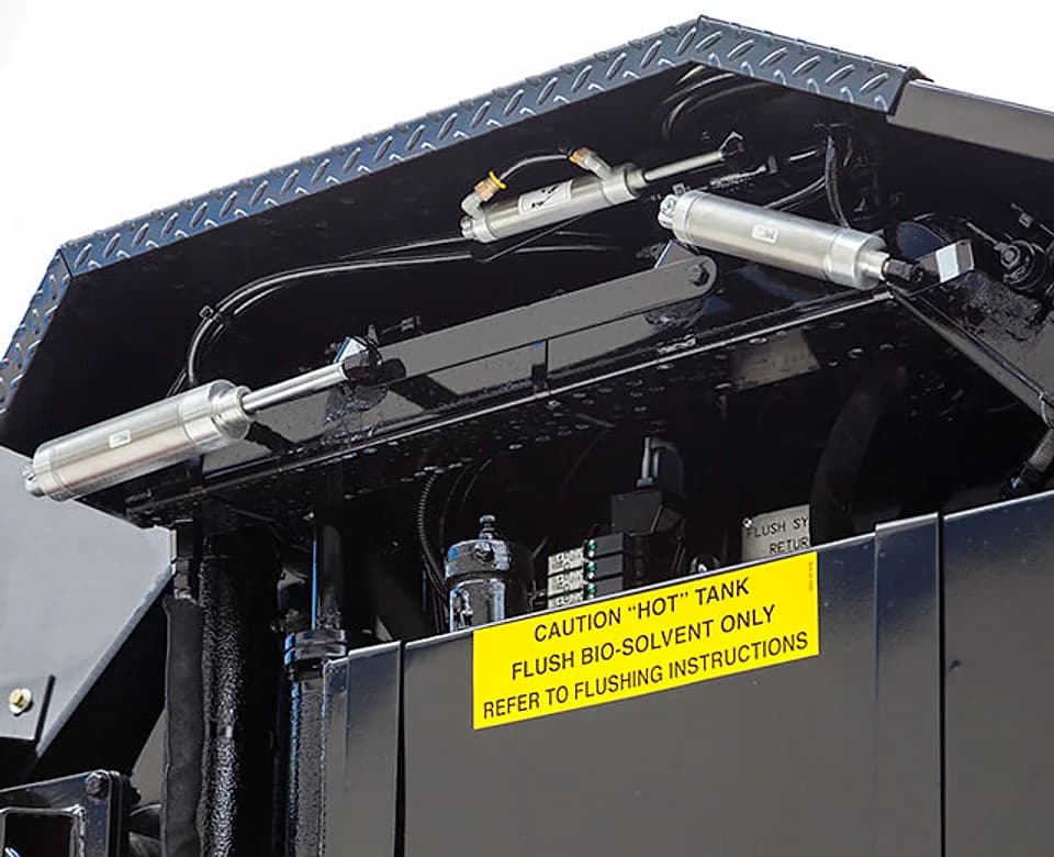 Roadtec SP-200 spray paver automated flush system
