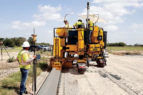 GOMACO GT-3600 paving curb with stringline and 3D guidance support